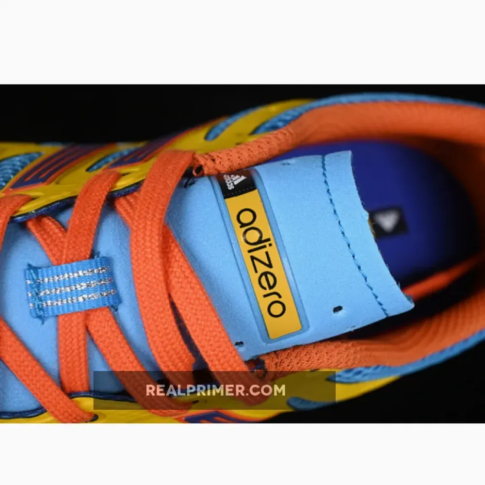 ADIZERO ARUKU SKY RUSH/LUCID BLUE/ORANGE JH8074