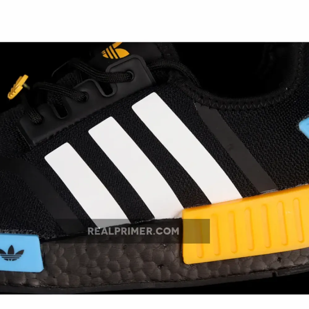 NMD_R1 SHOES CORE BLACK/CLOUD WHITE/COLLEGIATE GOLD FZ5876