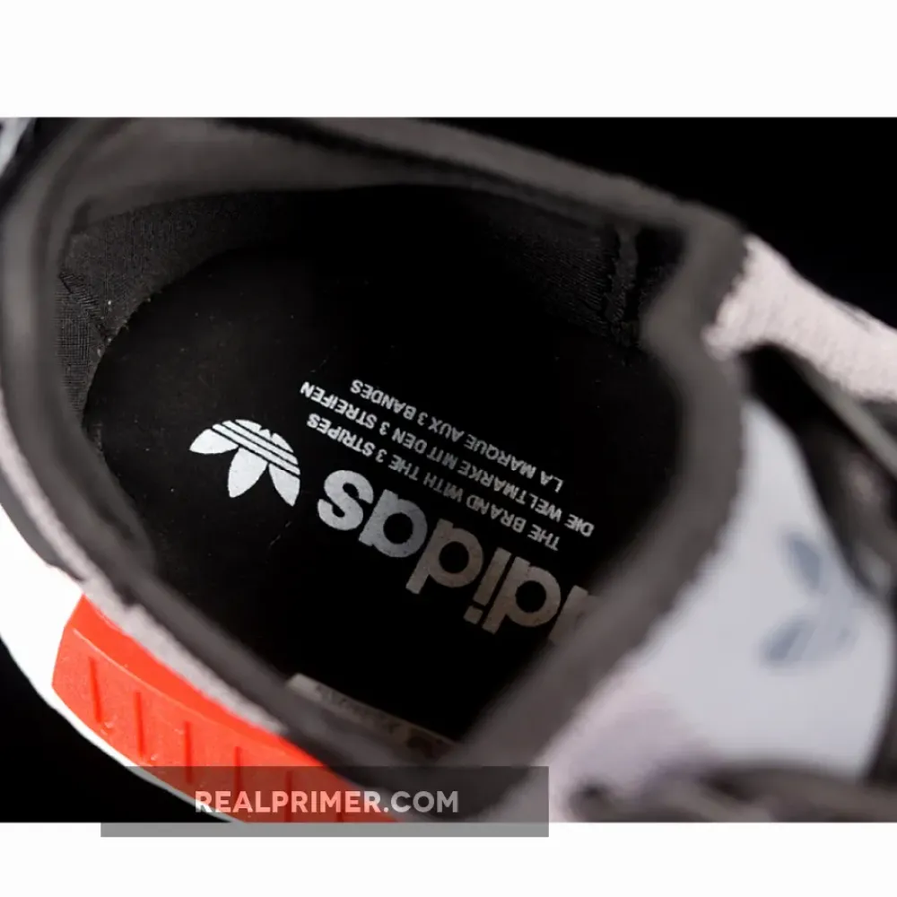 NMD R1 BOOST GREY FOUR/CORE BLACK-CLOUD WHITE GZ7924