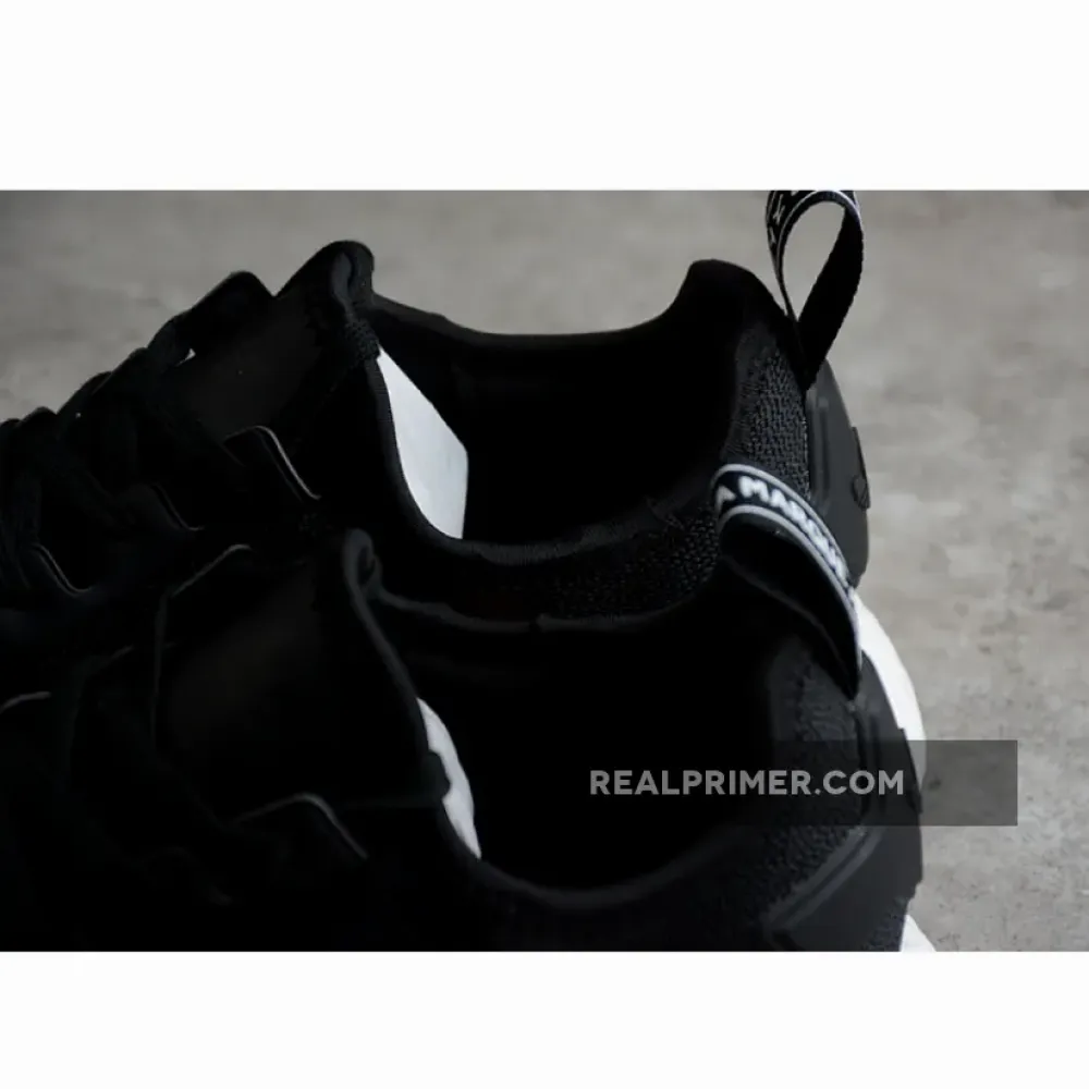 NMD_R1 BOOST SHOES CORE BLACK/CORE BLACK/CLOUD WHITE GZ7922