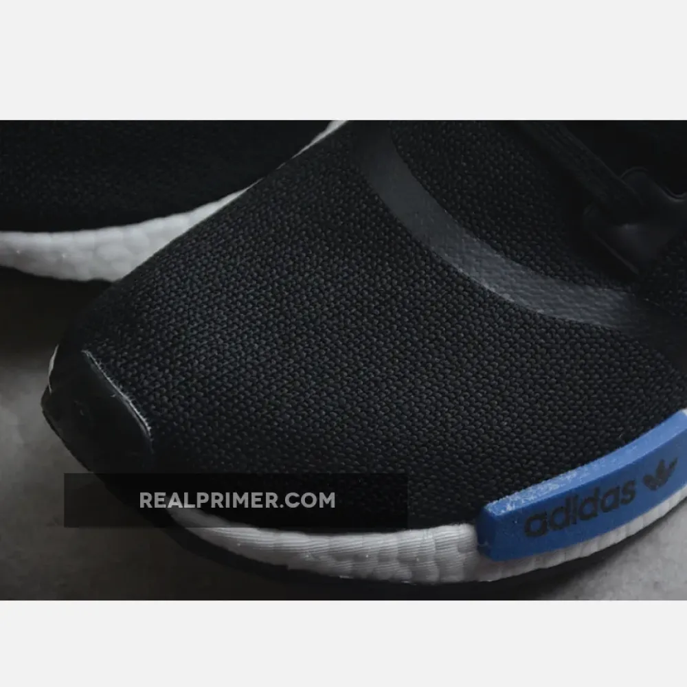 NMD_R1 BOOST SHOES CORE BLACK/CORE BLACK/CLOUD WHITE GZ7922