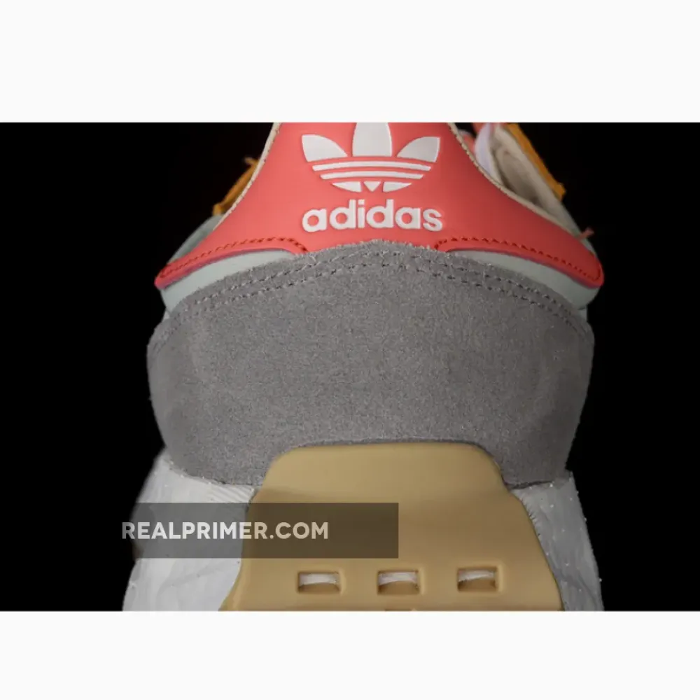 RETROPY E5 SHOES CLOUD WHITE/ORANGE-DARK GREY GY1033