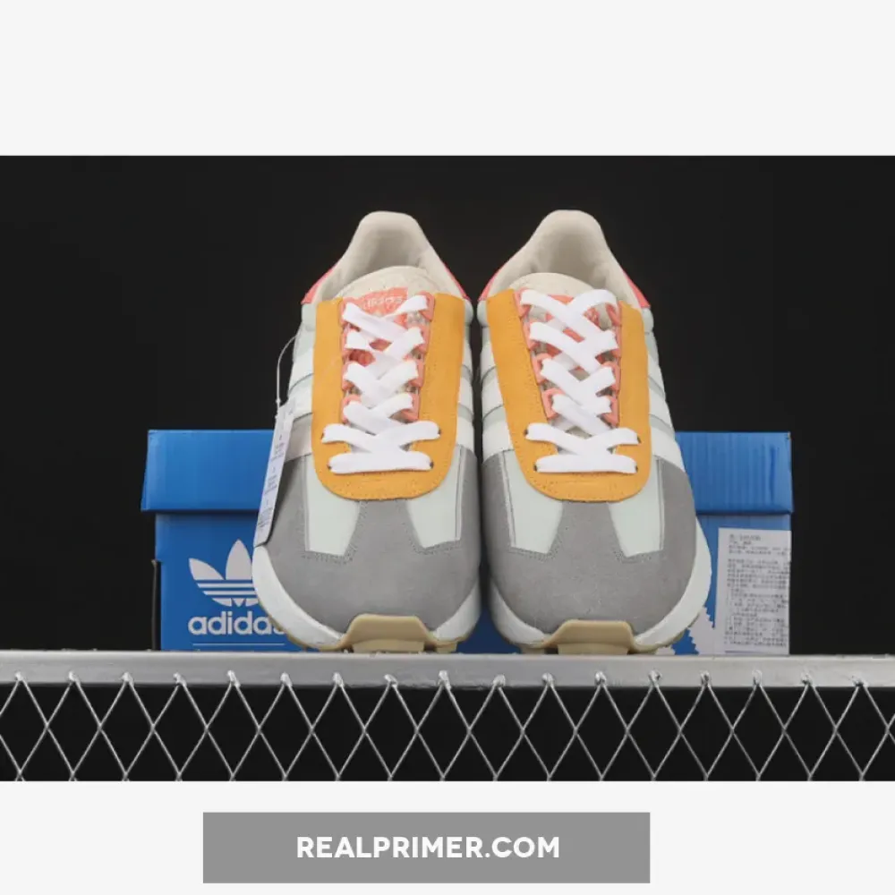 RETROPY E5 SHOES CLOUD WHITE/ORANGE-DARK GREY GY1033