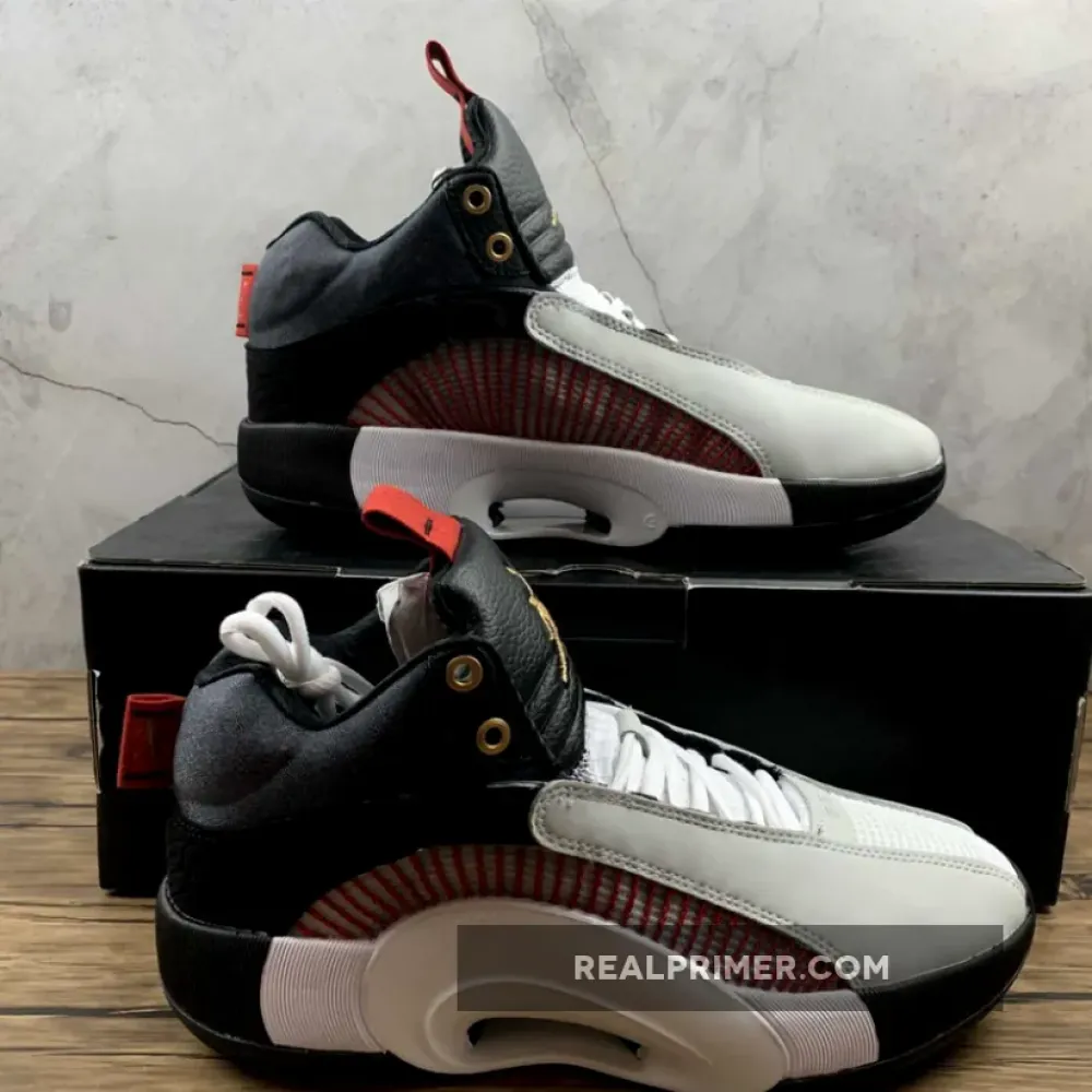 TITAN X AIR JORDAN 35 10TH ANNIVERSARY BLACK/METALLIC GOLD/SAIL DD4701-001