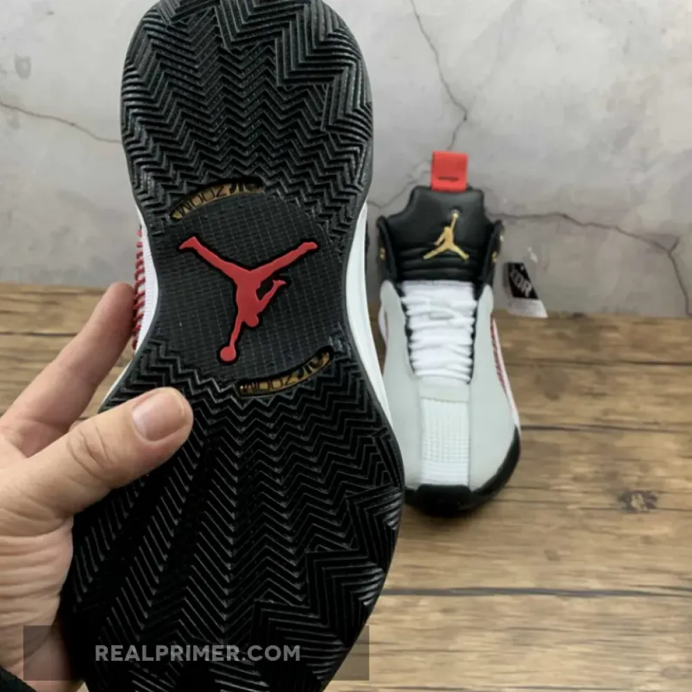 TITAN X AIR JORDAN 35 10TH ANNIVERSARY BLACK/METALLIC GOLD/SAIL DD4701-001