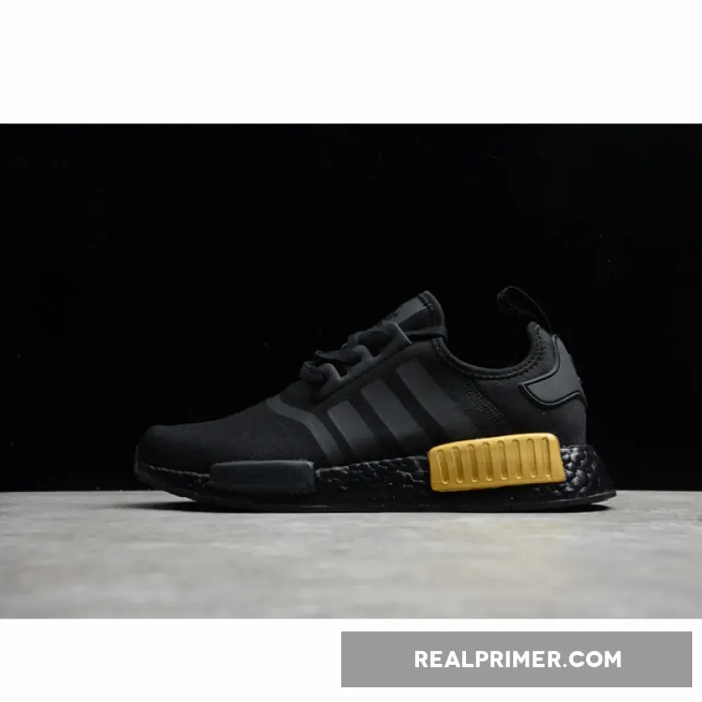 NMD_R1 SHOES CORE BLACK/CORE BLACK/GOLD METALLIC FV1787
