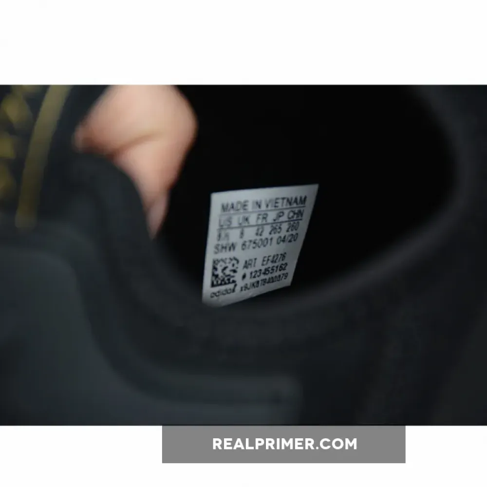 NMD_R1 SHOES CORE BLACK/CORE BLACK/GOLD METALLIC FV1787