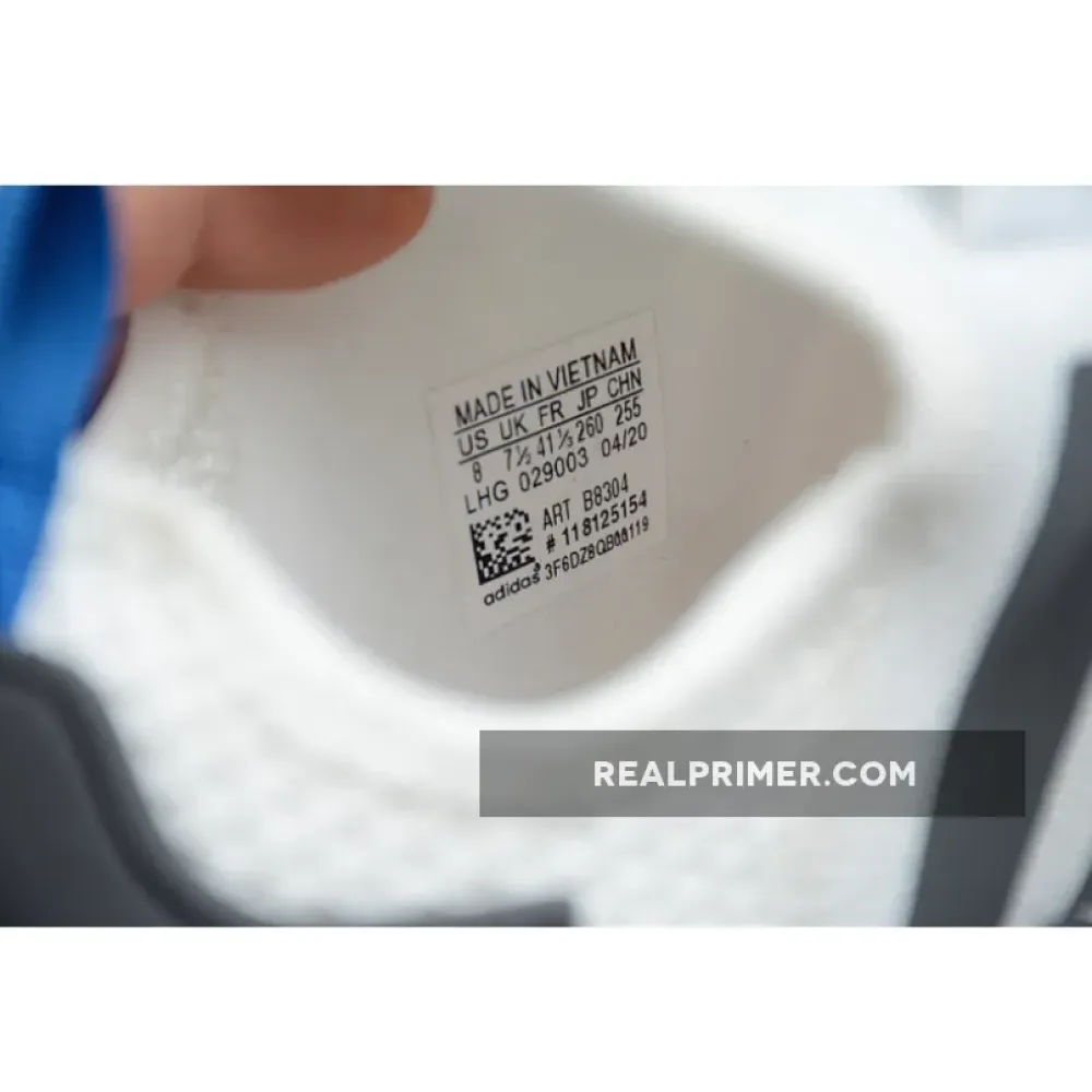 NMD R1 SHOES CLOUD WHITE/CORE BLACK/BLUE B8304