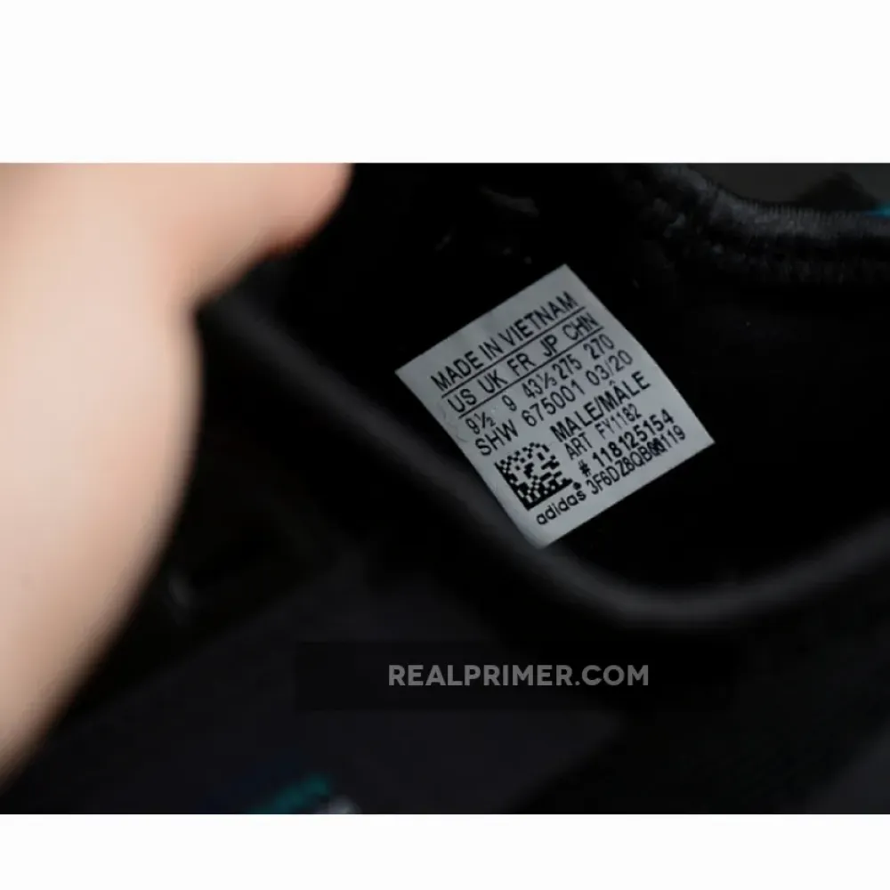 NMD R1 BOOST V2 TOKYO CORE BLACK/BLUE/YELLOW-RED FY1182