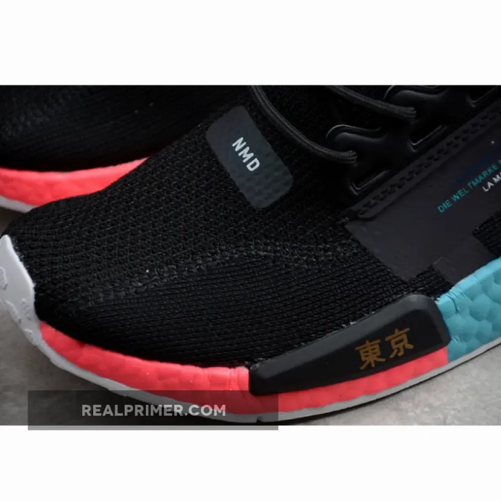 NMD R1 BOOST V2 TOKYO CORE BLACK/BLUE/YELLOW-RED FY1182
