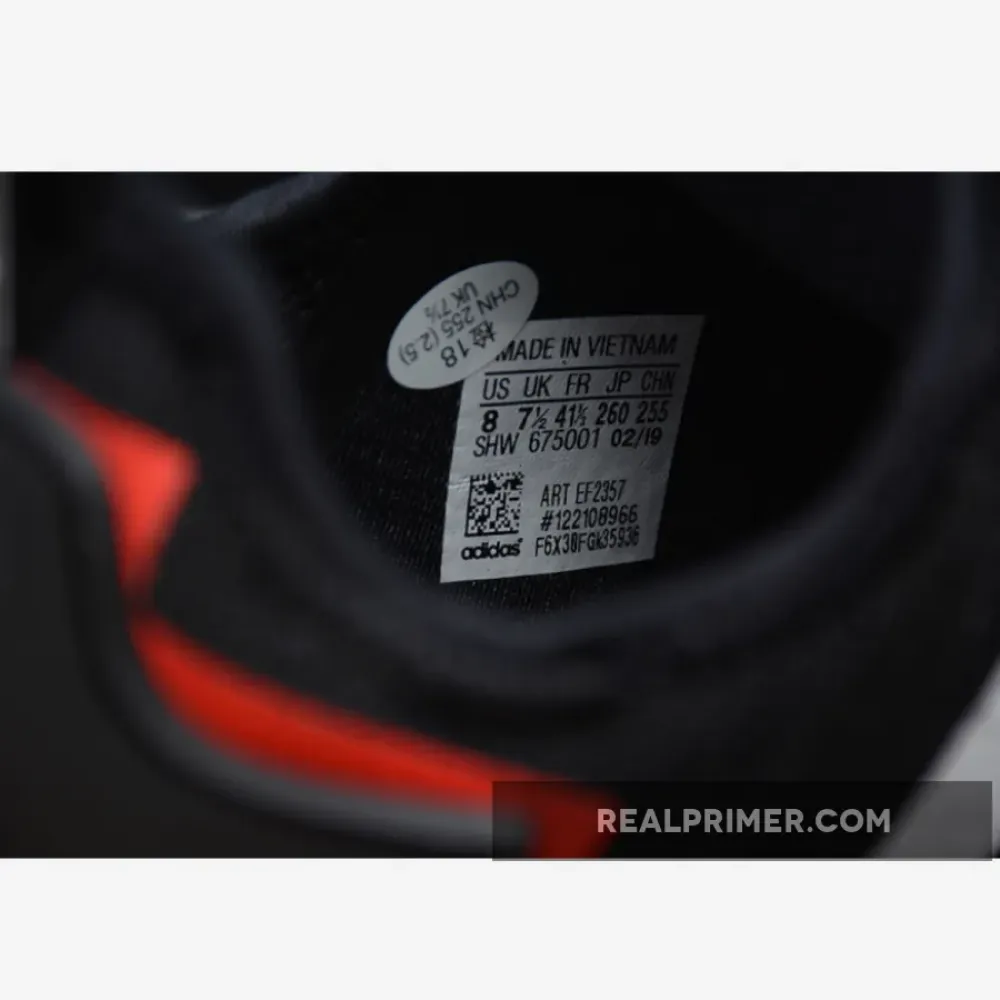 NMD_R1 SHOES CORE BLACK/CLOUD WHITE/LUSH BLUE EF2357