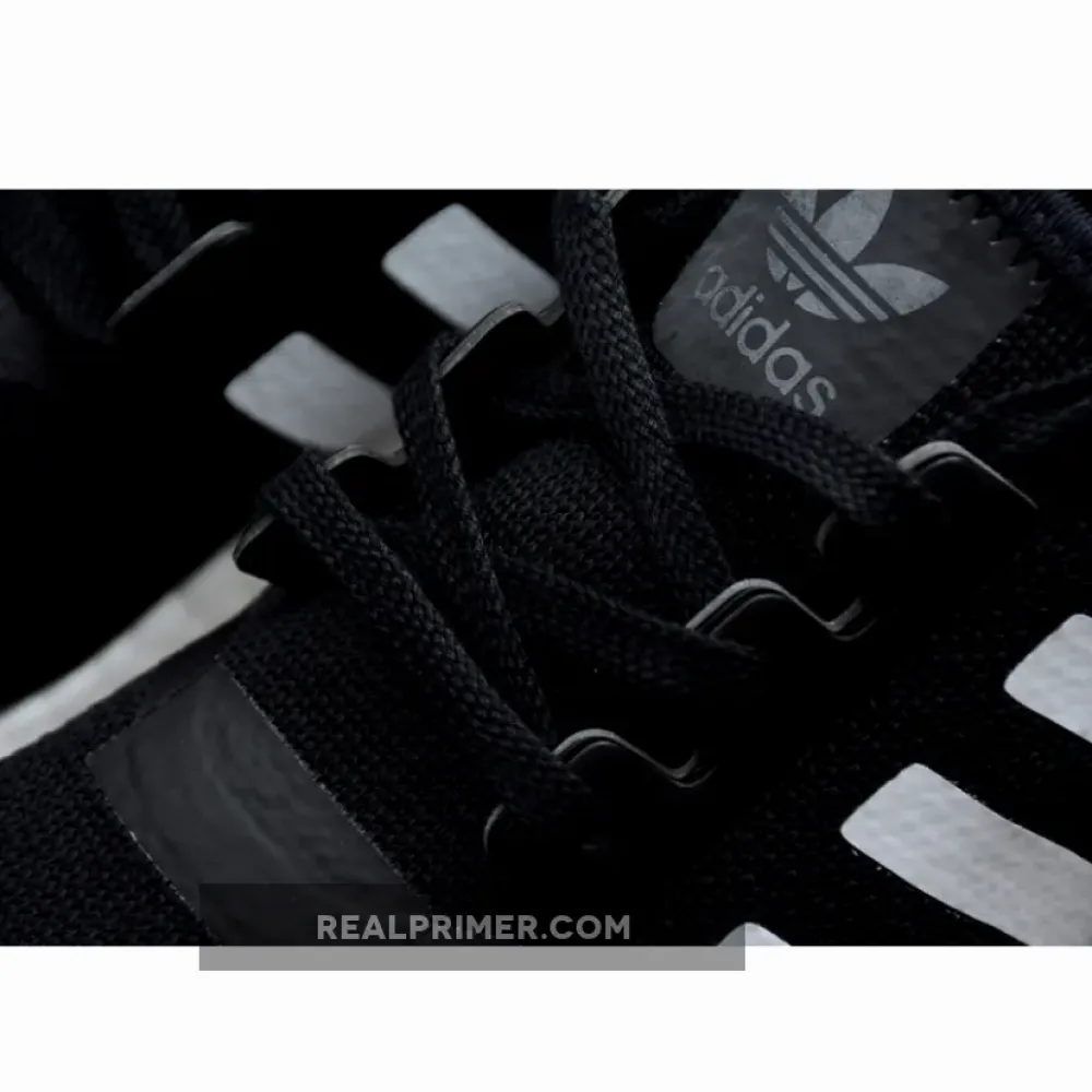 NMD_R1 SHOES CORE BLACK/CLOUD WHITE/LUSH BLUE EF2357