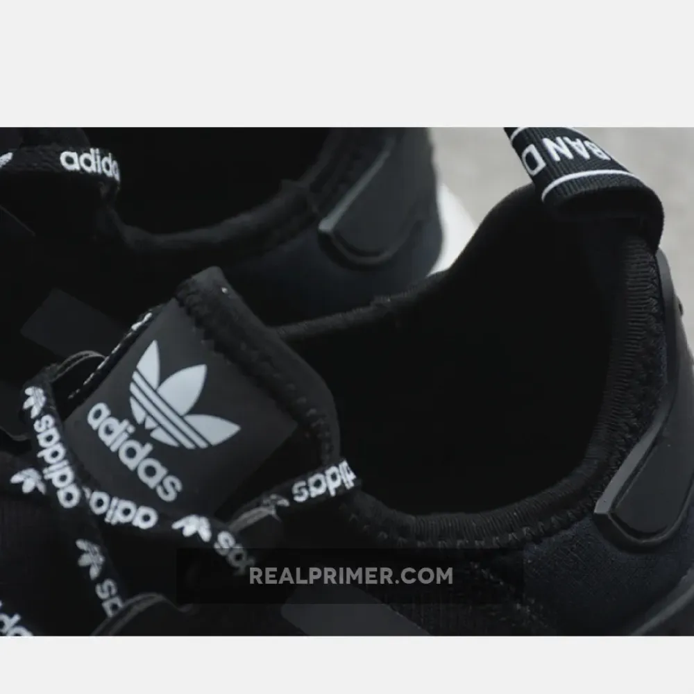 THE NMD R1 CORE BLACK/CORE BLACK-FTWR WHITE 1-110