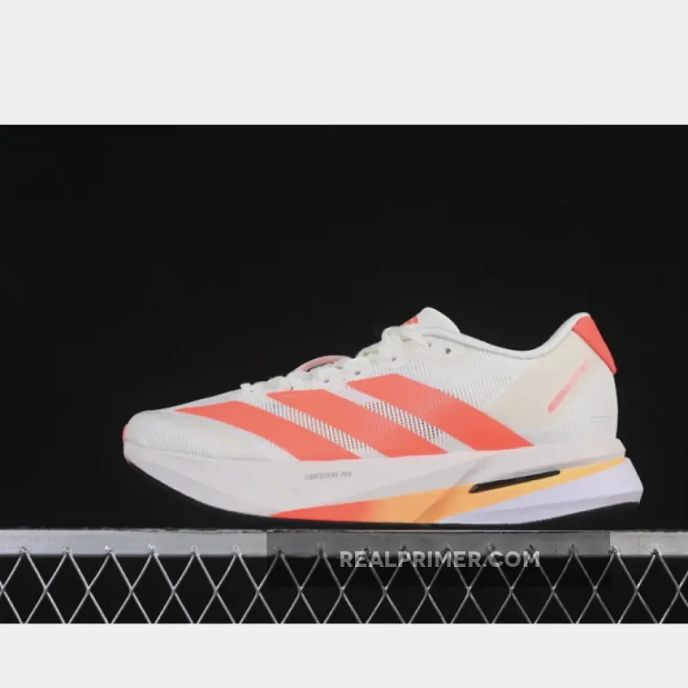 ADIZERO BOSTON LOW-TOP RUNNING SHOES BEIGE/ORANGE HQ7412